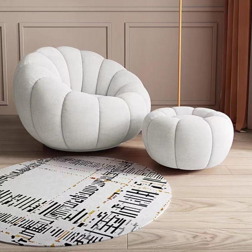 Canapé beige + repose-pieds