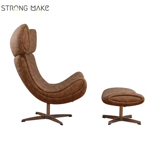 Metà del secolo schienale alto in pelle sintetica girevole funzione in fibra di vetro poltrona con pouf pouf - Product Image 2