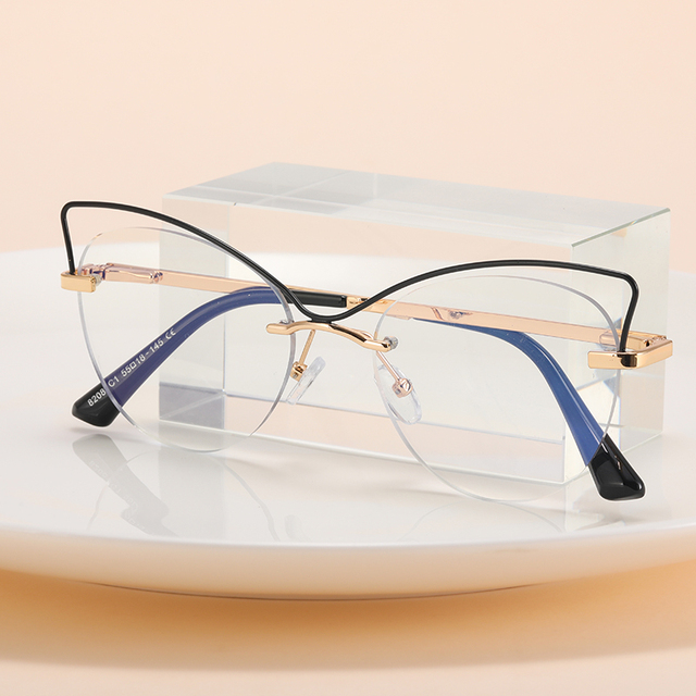 High Quality Wholesale Trendy New Retro Eyeglass Frame Women's Eyewear Art Frameless Flat Mirror Metal Round Frame Glasses