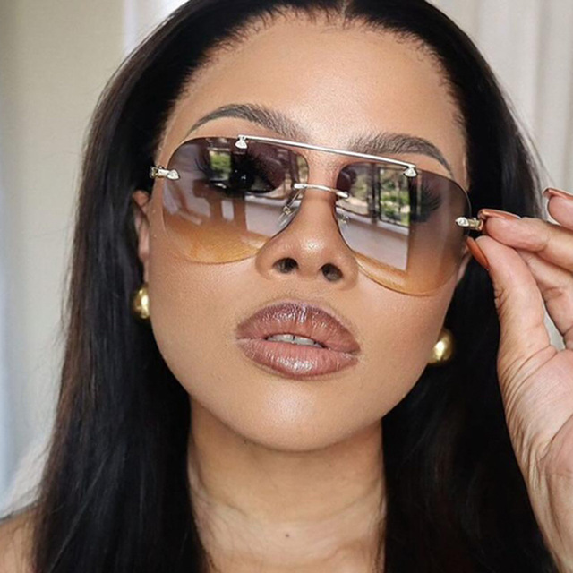 Frameless Toad Shaped Sunglasses UV400 Women's 2024 New European American Fashion Street Shot