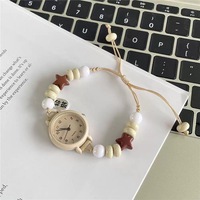Montre à quartz pour femme NYY avec cordon tressé à perles étoiles mignonnes, cordon de serrage réglable, design écologique en cristal acrylique