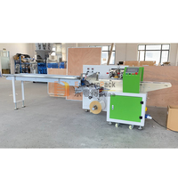 Coussinets hygiéniques jetables d'emballage à flux horizontal entièrement automatique et machine d'emballage de couches pour bébés