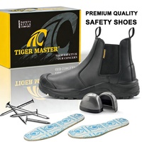 Sepatu Safety Kulit Hitam OEM Kokoh Anti-Hantaman Anti-Tusuk Tahan Minyak & Anti-Selip Tanpa Tali untuk Pria Pekerjaan Industri