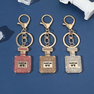 Porte-clés de luxe en alliage métallique avec pendentif en cristal brillant, boussole émaillée personnalisée pour breloque de sac femme, idéal pour l'art et l'artisanat - Product Image 1