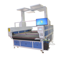 Machine de gravure laser industrielle à double rail 2024 double tête asynchrone et alimentation automatique pour tissu en cuir