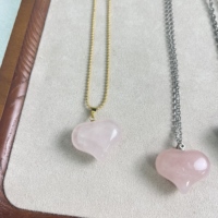 Grossiste Pendentifs de guérison en forme de cœur en quartz clair Pierre de cristal rose clair en forme de cœur à vendre