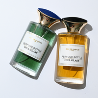 Flacon de parfum élégant et luxueux en verre plat incurvé de 50 ml avec bouchon poli bicolore