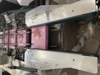 Machine d'emballage automatique pour serviettes hygiéniques, bandages, pansements, sachets et boîtes de cartonnage