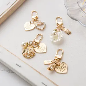 Gold Metal Letter Shell Conch Pearl Keychain Cute Heart Pearl Pendant Keychain Charm Women Girl Bag Accessories Key Ring