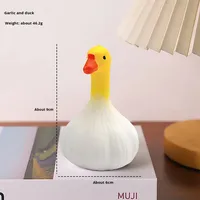 Jouet en caoutchouc souple en forme de canard à l'ail de style bouddhiste - Soulagement de l'anxiété et de la tension sensorielle pour une utilisation au bureau