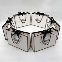 Sac en papier personnalisé avec logo et ruban pour vêtements, bijoux, emballages de boutique avec cadre noir