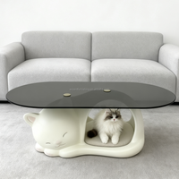 Table basse en FRP avec base creuse en forme de chat adorable et plateau en verre élégant alliant fonctionnalité et mignonnerie