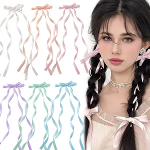 Kore tasarım moda kız çiçek yay saten süper peri büyük uzun kuyrukları ilmek saç fiyonkları saç klipleri örgü saç kravat