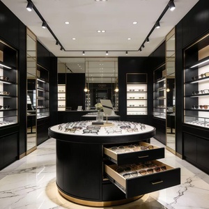 Ensemble d'agencements de magasin d'optique de luxe personnalisable avec éclairage LED en verre trempé, design durable - Meubles muraux ronds pour îlot central - Product Image 6