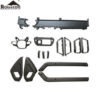 Accessoires de voiture : Kit de garnitures intérieures en carbone sec pour console centrale (2 pièces) pour Land Rover Defender 2020+