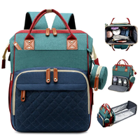 Sac à dos de voyage pliable multifonctionnel Sac à couches résistant à l'eau Organisateur de poussette avec lit de bébé pour maman en déplacement