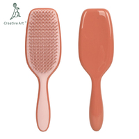 Brosse démêlante en gros pour cheveux bouclés et lisses