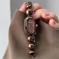 Montre pour femme au design créatif de grains de café, style bracelet rétro, marque artistique, haute beauté, nouvelle tendance 2025, célébrité d'Internet populaire