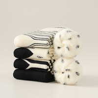 Chaussettes mi-mollet en coton épais et polaire pour femme, rayées noir et blanc, chaudes et douillettes pour l'automne et l'hiver