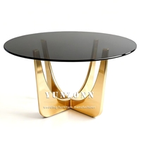 Table de salle à manger ronde de luxe en acier inoxydable avec plateau en verre doré pour événements et mariages
