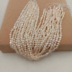 <span class=keywords><strong>4</strong></span>-5mm AA + Mini perla de agua dulce barroca suelta en hebra Venta al por mayor hebra de perlas de agua dulce - Product Image 3