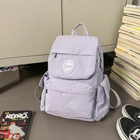 Sac à dos d'extérieur léger et tendance Nouveau sac à dos de voyage simple et polyvalent pour femmes Sac pour filles