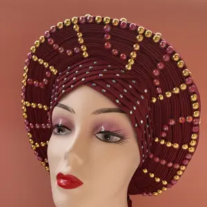 2023年女性のためのアフリカのヘッドタイナイジェリアのジェレはすでに自動ジェレヘレターバン大きなつば美しい結婚式のヘッドタイを作りました