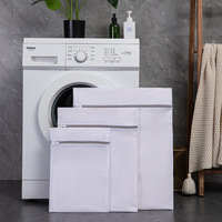 Grand sac à linge en polyester épaissi pour machines à laver, empêche la déformation, design minimaliste moderne avec maille fine