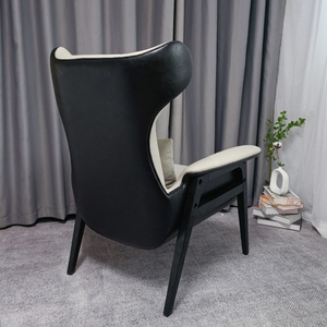 Fauteuil de relaxation moderne et minimaliste à dossier haut, avec cadre en bois massif et revêtement en cuir, inclinable et réglable, pour la maison, le bureau ou la chambre. - Product Image 4