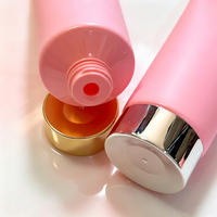 Tube d'emballage cosmétique rose en PE de 100 ml pour gel douche et lotion solaire, personnalisable avec logo, petite série