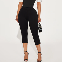 Pantalon Capri pour femme à taille élastique et taille haute, avec détail nœud, couleur unie, coupe évasée, ourlet fendu, coupe ample et respirant