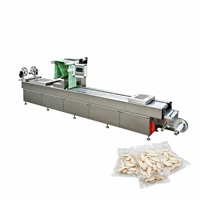 Automatische commerciële hoog-efficiënte productieve elektrische continue rolvoorraad skin film tray seal vacuümverpakkingsmachine