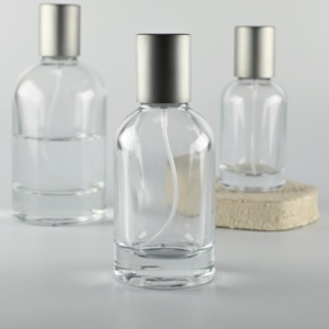 Offre Spéciale <span class=keywords><strong>Labo</strong></span> Bouteilles de parfum à étiquette personnalisée rondes de 30ml 50ml 100 ml Flacon vaporisateur de parfum en verre unique avec couvercle en argent - Product Image 3
