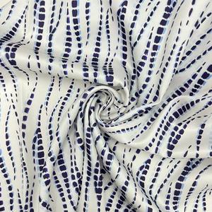 Vải satin lụa giả, chất liệu polyester 100%, họa tiết sóng chấm ảo ảnh quang học, in màu xanh đậm nhuộm tie dye, có sẵn trong kho, dùng may quần áo - Product Image 1