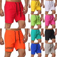 Shorts de sport respirants à séchage rapide pour hommes, personnalisables OEM, couleur unie, grande taille, avec cordon de serrage, pour la gym, la course, l'entraînement et la plage