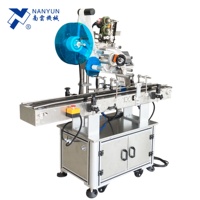 Machine d'étiquetage inviolable pour boîtes à clapet anti-effraction, emballages C-wrap, boîtes à fruits et légumes, bouteilles, bocaux et scellage des coins