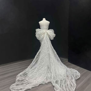 Robe de mariée longue sirène moderne de luxe sans manches en tulle avec appliques florales et nœud pour NT76 - Product Image 2