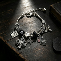 Bracelet Fanhua Jewelry, best-seller TikTok, en acier inoxydable plaqué or, étanche, avec motifs Corbeau, Rose, Pique et Boule 8