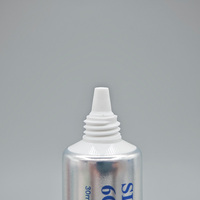 Envase de Crema Facial de Aluminio y Plástico de 22 mm de Diámetro con Acabado Brillante, con Boquilla y Tapa Acrílica Transparente