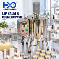 Machine de remplissage de pâtes avec trémie de mélange chauffée pour rouge à lèvres, baume à lèvres, cire, crème cosmétique, agitation uniforme et versement contrôlé