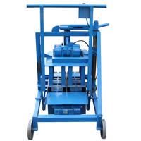 Machine manuelle de fabrication de blocs de terre compressée Petite machine manuelle de fabrication de briques de ciment interlock/Machine manuelle de fabrication de briques de cendres volantes QMR 2-40