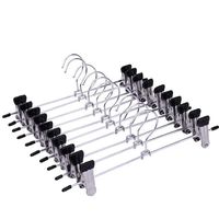 Petits cintres en métal avec revêtement en caoutchouc Cintres à un niveau pour jupe et pantalon pour armoire avec clips