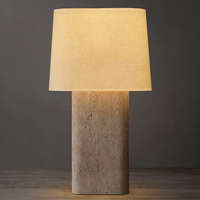 Lampe de table moderne minimaliste avec base en pierre et abat-jour en tissu, idéale pour chambre à coucher, chevet, salon, villa, hôtel, restaurant et projets.