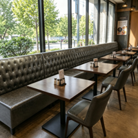 Ensemble de restaurant moderne en cuir tufté à la main, table avec plateau en pierre, structure métallique, banquette 4 places, écologique, durable, OEM/ODM