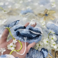 Chine prix de gros 3d fleur brodé dentelle tissu broderie coloré tissu pour robe de soirée de mariage