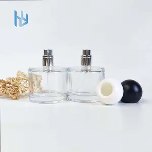 High-end taşınabilir seyahat 30ml 50ml parfüm cam kaplar yuvarlak doldurulabilir parfüm şişe ambalajlama