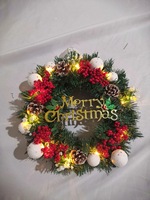 Guirlande de Noël artificielle pré-éclairée avec lumières LED, baies rouges, cônes de pin et inscription Joyeux Noël pour la décoration des fêtes