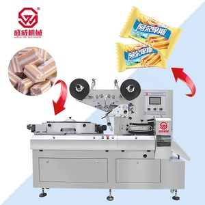 Machine d'emballage horizontale entièrement automatique à grande vitesse pour bonbons, sucettes, gommes, et autres confiseries souples ou dures - Product Image 1