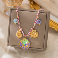 Collier en acier inoxydable plaqué or 18 carats PVD style Charme Côtier avec perles émaillées en forme de coquillage et corde tressée, bijoux inspirés de l'océan