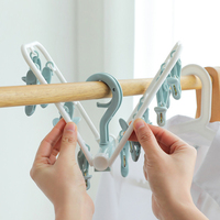 Iknow Cintre mural pliable avec pince pour vêtements, doté de diverses fonctions de séchage, idéal pour la salle de bain et le salon